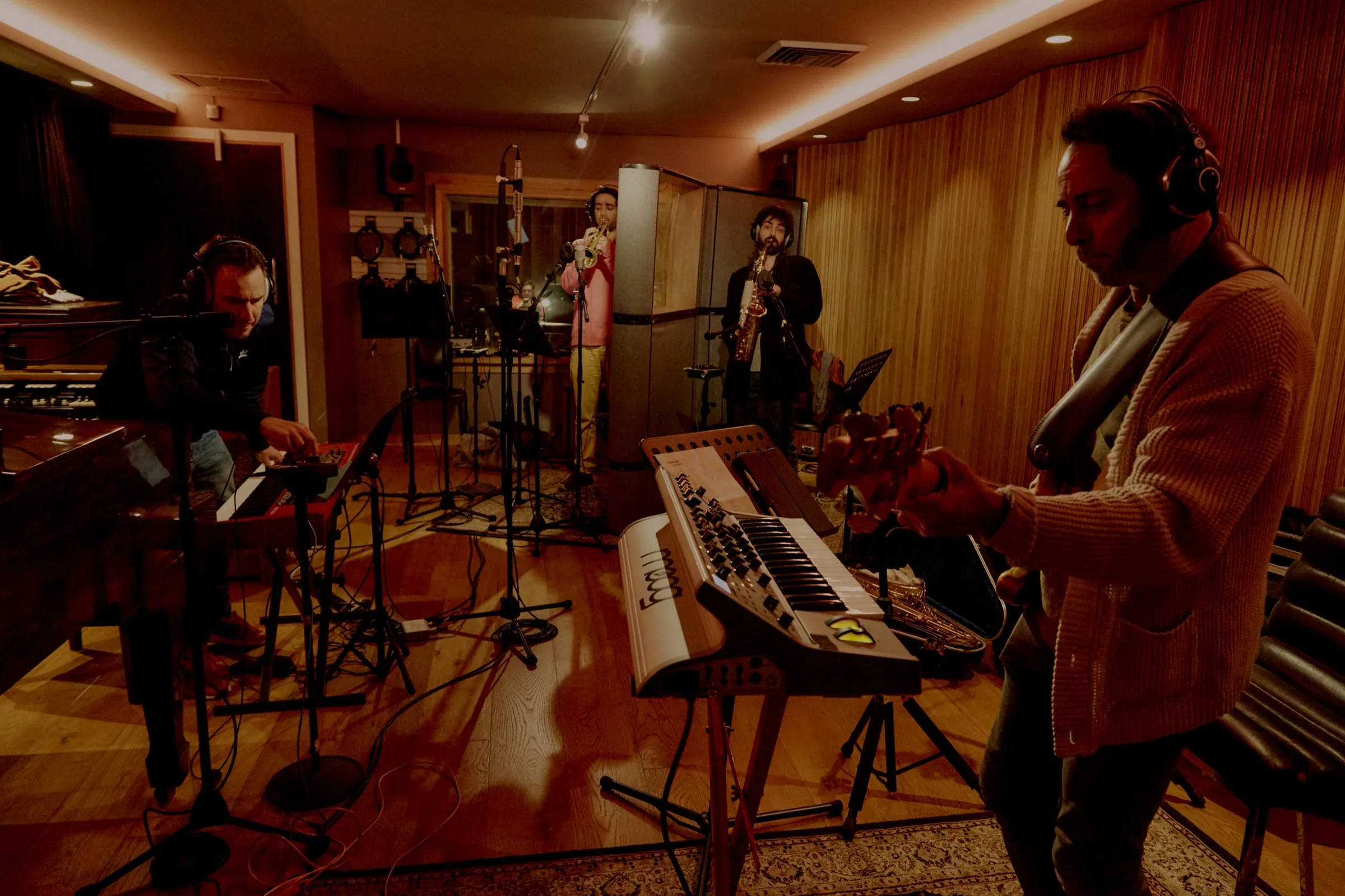 The whole A Sharp live room in session - keys, brass, guitar and a forest of microphones