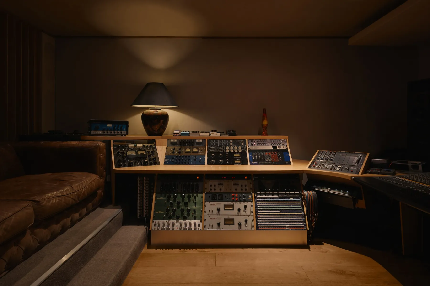 Outboard racks and the leather lounge under lamp light